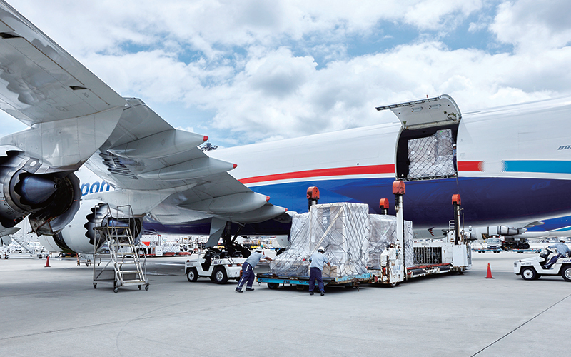 The aircraft is conducting air freight transportation of goods.